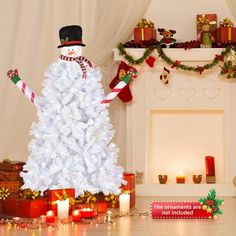 a decorated christmas tree in front of a fireplace