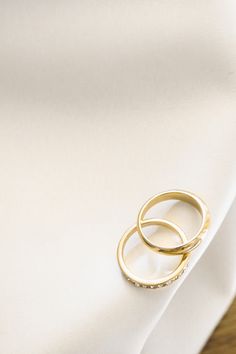 Ring set that's sure to go great with your ring party. Gold bands, one simple metal and the other with CZ stones. Two classics that can be worn together or separate. Both size 7. One size. Gold Stainless Steel Minimalist Ring, Two Of A Kind, Party Rings, Cz Stone, Gold Bands, Ring Set, Ring Sets, Size 7, Band