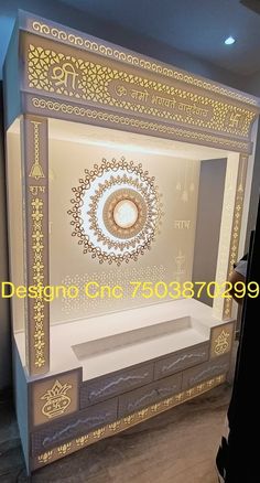 the display case is decorated with gold and white designs