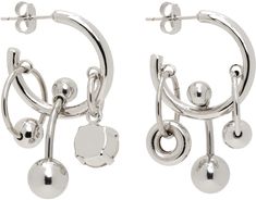 Pair of handcrafted mismatched open hoop earrings in palladium-plated brass. Graphic charms and crystals throughout. · Post-stud fastening · H1 x D0.75 Supplier color: Crystal Justine Clenquet, Open Hoop Earrings, December 2024, Girly Jewelry, Color Crystal, Luxury Streetwear, Uk Shop, Designer Fashion, How To Find Out