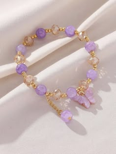 Color: Purple Material: Glass Gender: Women Product Measurements in cm : Size Diameter one-size 5.5 Cute Butterfly Bracelets, Jewelry Accessories Necklace, Purple Bracelet Preppy, Beaded Bracelets Big Beads, Light Purple Accessories, Purple Accessories Jewelry, Beaded Charm Bracelets, Purple Bracelets Beads, Purple Jewelry Aesthetic