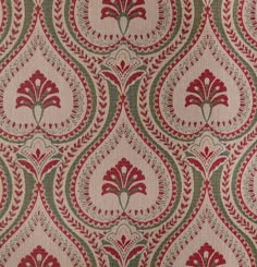 a red and green pattern on fabric