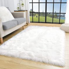 PRICES MAY VARY. 🐑【Faux Fur Rug with Material】The white area rugs are made of premium durable faux sheepskin fur, extra thick and soft-touch features our carpet the superior fluffy hand-feel. Friendly to any age people or pets, no stimulation. 🐑【Non-slip Backing】Slip-resistant suede leather is used for the bottom side with great sewing, keeping the fuzzy rug fastened to the floor. It guarantees both stability and beauty. 🐑【 Perfect Size 】TENNOLA faux sheepskin rug is approx 36in x 59in, perfe Nursery Room Luxury, Fuzzy White Rug, Fur Rug Bedroom, Rug Fuzzy, White Fluffy Rug, Luxury Room Decor, White Faux Fur Rug, Area Rugs For Bedroom, Rug Fluffy