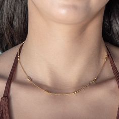 our Wildest Dreams Necklace is designed for effortless daily wear, making it a must-have for your jewelry essentials. its delicate and versatile design allows for easy layering. a dainty and versatile layering piece that will add an understated touch to any look. 18k gold pvd over 316 stainless steel water resistant 2mm beads 16.5" long with 2" extender ideal for layering Minimalist Tiny Beads Chain Necklace For Everyday, Everyday Hypoallergenic Yellow Gold Necklace, Minimalist Tiny Beaded Necklaces For Layering, Gold Jewelry With Tiny Beads For Layering, Yellow Gold Necklaces With Tiny Beads For Everyday, Dainty Everyday Chain Necklace, Dainty Adjustable Chain Necklace For Everyday, Delicate Jewelry With Tiny Beads For Layering, Delicate Layering Jewelry With Tiny Beads