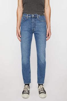 Modern Denim Blue Straight Leg Cropped Jeans, Modern Cropped Jeans With Five Pockets In Rigid Denim, Modern Cropped Jeans In Rigid Denim, Modern Cropped Straight Leg Jeans In Denim Blue, Modern Blue Cropped Leg Jeans, Modern Blue Cropped Jeans, Tapered Rigid Denim Cropped Leg Jeans, Modern Rigid Denim Jeans With Straight Hem, Tapered Cropped Leg Rigid Denim Jeans