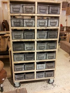 a large wooden shelf filled with lots of drawers