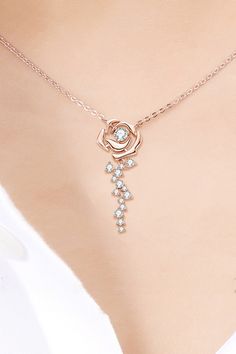 Look like a blooming beauty with this necklace made of 925 sterling silver and adorned with moissanite and 18k rose gold plating. Perfectly polished for a charming touch. Comes with a matching box and features a chain length of 18 inches and pendant diameter of 1.2 inches while weighing in at just 0.1 ounces (0.56 carats).