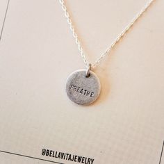 Make a statement with the messages in this hand stamped collection! 1/2" Round Antique Pewter Charm on Sterling Silver Chain Chain Length - 18" with 2" extender 1/2" pendant is also available in other metal options, see separate listings: sterling charm/sterling chain, 14k gold filled charm/14k gold filled chain. Want to add charms or birthstones and customize your necklace? Click here: CHARM BAR OR call us to guide you through the design at 501.396.9146 If you choose a custom mantra, please spe Elegant Gift Wrapping, Charm Necklace Silver, Antique Pewter, Handcrafted Necklace, Hand Stamped Jewelry, Stamped Jewelry, Gold Filled Chain, Sterling Silver Charm, Elegant Gift