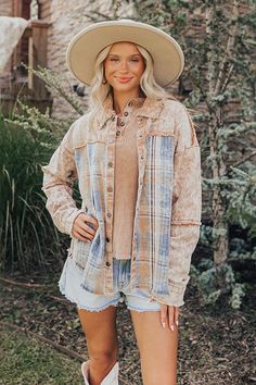 - Capture that cozy fall vibe with this must-have denim layering piece! The timeless plaid print and vintage-inspired details will have you feeling all the pumpkin spice feels. - Unlined denim material - Camel coloring at the top and a plaid pattern on the bottom featuring ivory, iced mocha, red, and different blue hues - Frayed, unfinished seam accents - A collared neckline - A button closure front - Long sleeves with button closure cuffs and frayed detailing - A relaxed silhouette that ends in Fall Cotton Shacket, Cotton Shacket For Fall, Washed Long Sleeve Shacket For Fall, Long Sleeve Washed Shacket For Fall, Trendy Washed Shacket For Fall, Trendy Washed Fall Outerwear, Trendy Washed Outerwear For Fall, Plaid Denim Outerwear With Pockets, Trendy Plaid Cotton Outerwear