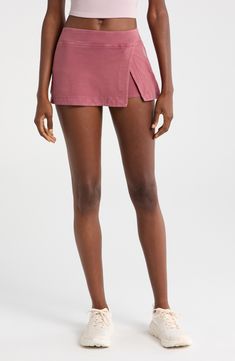 Built-in shorts offer confident coverage whether you're smashing returns or simply chilling on the couch in this soft, sporty skort. 11" length; 2" inseam; 20" leg opening (size Medium)   Pull-on style   Back zip pocket   Built-in shorts   95% cotton, 5% spandex   Machine wash, tumble dry   Imported Cotton Tennis Skirt With Built-in Shorts, Loungewear Skort With Built-in Shorts, Short Length Skort With Built-in Shorts For Loungewear, Casual Short Tennis Skirt With Built-in Shorts, Cotton Athleisure Skort In Short Length, Casual Sports Skort In Short Length, Fitted Cotton Skort In Athleisure Style, Fitted Cotton Skort For Athleisure, Cotton Athleisure Fitted Skort