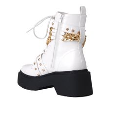 Let's bring rock n' roll vibe back with EMELIE. Bold chain with buckle punctuates this lug sole boot with stylish feel to bring out your edgy appeal. Wear them with cropped jeans, skirts, or tights. Vegan leather upper with man made sole Side zipper closure Heel measures approx. 2.5" H Platform measures approx. 1.5" H Imported Lug Sole Boots, Stylish Boots, Lug Sole, Wedge Sneaker, Timberland Boots, Shoe Box, Cropped Jeans, The Rock, Fashion Boots