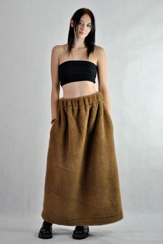 This is our no. 131 of Conscious Clothing Concept. This is a long maxi sheep's wool skirt that will keep you warm during the coming cold winter.  The pockets are placed in the side seams so you can keep your hands warm as well. It is the ultimate warm fabric for cold weather as it breathes and not allows body to sweat. Please be aware that this skirt will not look slimming :) Please write me a note if you would like any other colour from our fabric options, using a number or a name of a colour o Beige Maxi Skirt With Pockets For Fall, Baggy Long Skirt For Fall, Brown Lined Skirt For Winter, Brown Long Skirt Bottoms For Winter, Brown Full Skirt Bottoms For Winter, Baggy Wide Leg Maxi Skirt For Fall, Brown Long Skirt For Winter, Brown Full Skirt For Winter, Winter Brown Lined Skirt