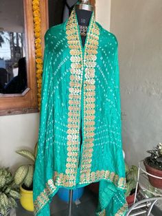 *Women ethnic motifs Gotta pati work Dupatta . *Rama green color  *Four sided lace border. Material:silk  Length:2.9 Width:39 Hand wash Bohemian Semi-stitched Raw Silk Traditional Wear, Bohemian Traditional Wear With Bandhani Print For Festivals, Bohemian Bandhani Traditional Wear For Festivals, Traditional Green Wear With Zari Work In Chinon, Green Traditional Wear With Zari Work In Chinon, Green Chinon Traditional Wear With Zari Work, Bohemian Bandhani Print Transitional Dupatta, Embroidered Green Chinon Traditional Wear, Bohemian Bandhani Print Dupatta For Transitional Seasons