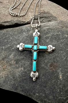 K Natachu Zuni Large Sterling Silver Blue Turquoise Cross Pendant Necklace Orders totaling $100 and up include an anti-tarnish treated velvet jewelry pouch!   The sterling silver chain measures approximately 24" X 2mm stamped 925 The pendant measures approximately 2 1/2" X 1.75"  The bale opening measures approximately 5mm Total weight is approximately 25 grams Condition: Pre-owned, Metal: Sterling Silver.  See photos for hallmark Comes in a gift box! Items in used condition will exhibit the exp Turquoise Cross Pendant, Necklace Cross, Turquoise Cross, Velvet Jewelry, Necklace Turquoise, Cross Jewelry, Cross Pendant Necklace, Blue Turquoise, Silver Blue