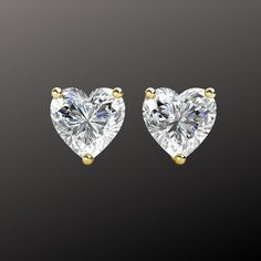 ✅ Stone Specifications: 💎 Type: Simulated/Created Diamonds 💎 Cut: Heart Cut 💎 Color: White D 💎 Clarity: VVS 💎 Size Total Carat Weight: 3.00 Carat - 1.50 Ct. Approx. 7 mm Each Stud 💎 Seller Warranty 💠 Stud Specifications: ⭐ Metal: Real Yellow Gold Solid ⭐ Purity: 14K .585 Europe ⭐ Setting: Heavy 3 Prong | solid ⭐ Fastening: Screw Back Non Pierced 14K Stamped ⭐ Stamped: 14K 🔹 Free Shipping. 🔹 Comes With Free Gift Box. 🔹 Simulated Diamonds set in 14k Gold 3-prong setting. 🔹 We guarantee Heart Shape Diamond Earrings, Heart Shaped Diamond Earrings, Heart Diamond Earrings, Diamond Heart Earrings, Heart Shape Earrings, Diamond Earrings For Women, Gold Heart Studs, Heart Shaped Earrings, Moissanite Earrings