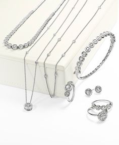 Get trendy style and a hint of sparkle, too. Trio by Effy Collection necklace features seven stations of round-cut, bezel set diamonds (1/2 ct. t.w.) strung on a delicate 14k white, yellow, or rose gold chain. Approximate length: 16 inches + 2-inch extender. Fine Jewelry In Diamond White For Everyday Luxury, Dazzling Jewelry With Brilliant Cut For Everyday Luxury, Everyday Luxury Cubic Zirconia Brilliant Cut Jewelry, Everyday Luxury Round Cut Diamond Jewelry, Everyday Luxury Fine Jewelry With Single Cut Diamonds, Refined Brilliant Cut Cubic Zirconia Jewelry, Formal Fine Jewelry With Single Cut Diamonds, Fine Jewelry In Platinum For Everyday Luxury, Everyday Luxury Fine Jewelry With Prong Setting