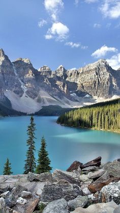 a mountain lake surrounded by trees and rocks