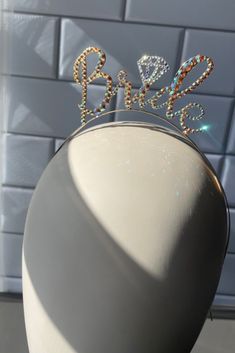 there is a cake topper with the word bling on it