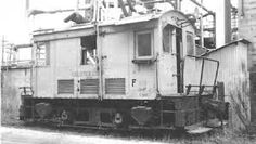 black and white photograph of an old train car