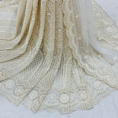 Wedding bridal  lehenga for women ready to wear chikankari lehenga with embroidered blouse and dupatta. * Plus size available at a small up-charge. * Size: This is custom made outfit as per your size. Post your order we will send you a measurements reference sheet using which you can provide details required to make your outfit with best fit. * Fabric and work: Lehenga - Heavy embroidery net fabric. Blouse - Embroidered  fabric. Dupatta - Embroidered net. * Delivery time: This lehenga set will take 2-3 weeks to produce after we have received your sizing details. Don't worry it can be made sooner too, just keep us informed, we will process it accordingly and deliver on or before a delivery date we discuss. *Rush Order : Please use shipping upgrade at checkout to enable expedite shipping opt Elegant Semi-stitched Lace Lehenga, Designer Lace Fitted Choli, Elegant Lace Choli For Festive Occasions, Lace Choli With Intricate Embroidery For Reception, Elegant Choli With Chikankari Embroidery, Elegant Festive Lace Choli, Designer Bollywood-style Lace Choli, Designer Bollywood Lace Choli, Designer Lace Sharara Semi-stitched