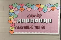 a bulletin board with hearts and words on it that says,'april kindness everywhere you go '