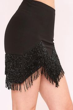 Boogie down in this jewel-encrusted fringe skirt. Move and shake in style with this sleek black skirt that's adorned with sparkly gems. Bedazzle the crowd with your funky moves! Black Woven Lined High-low hem Jewel fringe Zipper closure Stretch Party Skirt With Fringe, Stretch Fringe Skirt For Party, Stretch Skirt With Fringe For Party, Glamorous Fringe Bottoms For Party, Embellished Black Bottoms For Night Out, Black Sequined Mini Skirt For Party Season, Fitted Party Bottoms With Beaded Fringe, Glamorous Party Bottoms With Fringe, Glamorous Fringe Bottoms For Night Out