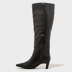 Get ready for the autumn or winter season with these Kendra Tall Dress Boots from Universal Thread™. These solid-color boots boast a faux-leather upper, pointed closed toe, cushioned insole and soft fabric lining for comfortable wear. Set on a 2.25-inch Louis heel, these side-zipper boots are elevated by the knee-high silhouette that lends extra flair to your outfit of the day. Universal Thread™: Found exclusively at Target.