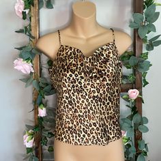 This Zara Camisole Offers A Perfect Blend Of Style And Comfort. Size Medium Nwt It Features A Fun, Leopard Print Pattern And Sleeveless Design For A Unique And Stylish Look. Crafted From Lightweight Polyester Fabric, This Camisole Gives You All-Day Comfort By Keeping You Cool And Comfortable. Experience A Refreshing New Style For This Season And Make A Statement With This Amazing Piece Of Apparel. - Zara Leopard Print - Sleeveless Camisole - Polyester - Camisole. - Adjustable Strap - Gold Straps Beige Cami Top For Night Out, Beige Sleeveless Crop Top For Night Out, Brown Camisole With Tank Straps For Summer, Brown Sleeveless Top For Party, Brown Summer Camisole With Tank Straps, Brown Tank Strap Camisole For Summer, Chic Brown Tops With Spaghetti Straps, Zara Tank Top For Party, Zara Casual Camisole For Night Out