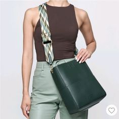 Made From Smooth Vegan Leather, The Demi Bucket Bag By Mersi Features A Roomy Interior With 4 Slot Pockets And A Magnetic Closure. This Listing Is For The Green Color, Which Comes With 2 Adjustable And Interchangeable Straps, And A Removable Mini Pouch. Height- 12" Length- 11" Depth- 5" Trendy Green Square Bucket Bag, Green Rectangular Bucket Bag With Detachable Strap, Chic Green Rectangular Hobo Bag, Trendy Green Hobo Bag With Adjustable Strap, Chic Green Rectangular Bucket Bag, Green Adjustable Strap For Bags, Everyday Green Adjustable Bag Strap, Green Adjustable Everyday Bag Strap, Green Rectangular Hobo Bag With Detachable Strap