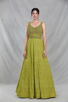 Green sleeveless full length gown with Mughal bloom embroidery using thread, sequin, beads and cutdana highlights. Paired with a ditsy sequin floret work dupatta. - Aza Fashions Sleeveless Anarkali Set With Intricate Embroidery For Party, Embellished Sleeveless Anarkali Set, Elegant Sleeveless Fitted Anarkali Set, Sleeveless Anarkali Set With Chikankari Embroidery For Wedding, Fitted Sleeveless Anarkali Set For Reception, Festive Sleeveless Dress With Resham Embroidery, Floor-length Embroidered Dress For Reception, Sleeveless Anarkali Maxi Dress For Reception, Reception Dress With Intricate Embroidery, Sleeveless