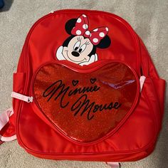 Brand New Disney Parks Water Bottle Pockets On Both Sides Red Mickey Mouse Backpack For Everyday Use, Red Disney Bag With Zipper Closure, Red Mickey Mouse Backpack, Red Disney Style Backpack For Disney Trips, Disney School Bag In Red, Minnie Mouse Backpack For Disney Fan Events, Red Disney Backpack, Disney Red Standard Backpack, Disney Red School Bag