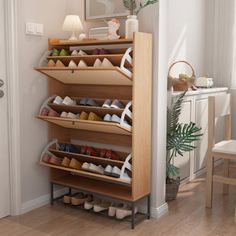 a shoe rack in the corner of a room