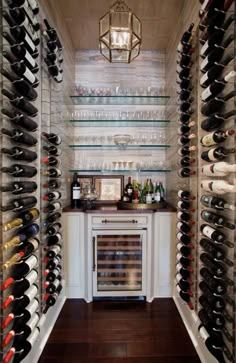 a wine cellar filled with lots of bottles