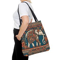 Experience the elegance and cultural richness of India with our handcrafted traditional tote bag. This exquisite accessory blends artistry with functionality, making it a perfect addition to your wardrobe. Key Features: Authentic Design: Each tote bag showcases traditional Indian motifs, intricately embroidered or printed by skilled artisans. The patterns draw inspiration from centuries-old cultural heritage, featuring elements like paisleys, florals, and geometric shapes. High-Quality Materials: Made from durable, eco-friendly cotton or jute, this tote bag is designed to withstand daily use. The fabric is soft to the touch yet sturdy, ensuring long-lasting quality. Vibrant Colors: Available in a variety of vibrant colors, the tote bag reflects the lively spirit of Indian festivals and cel Traditional Square Travel Bag, Traditional Rectangular Everyday Bags, Traditional Rectangular Bags For Everyday Use, Traditional Rectangular Bag For Everyday Use, Traditional Handheld Bag For Daily Use, Traditional Handheld Bag For Everyday Use, Traditional Tote Bag For Shopping, Traditional Shoulder Bag With Removable Pouch For Daily Use, Traditional Everyday Use Bags