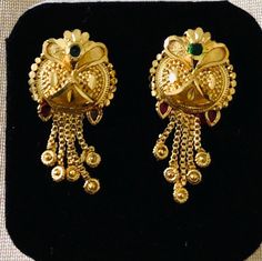 Indian dangling earrings are a traditional and iconic style of jewelry that originate from India and are popular throughout the Indian subcontinent. These earrings are known for their distinctive design, They are a significant part of Indian culture and are worn by women on various occasions, including weddings, festivals, and other celebrations. These earrings are for pierced ears.  Size:  1 inch Note: these earrings are for pierced ears only Occasions: Indian earrings are versatile and can be worn on various occasions, from everyday wear to special events like weddings, festivals, and other celebrations. Care: wipe with clean dry cloth Traditional Dangle Clip-on Earrings For Formal Occasions, Traditional Clip-on Earrings For Festive Occasions, Traditional Earrings With Intricate Design, Traditional Round Clip-on Earrings For Festive Occasion, Ornate Latkans Earrings For Festivals, Traditional Gold Clip-on Earrings For Festive Occasions, Traditional Style Dangle Danglers, Traditional Gold Clip-on Drop Earrings, Traditional Clip-on Jewelry For Festive Occasions