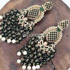 Stylish and exquisite ethnic - South-Asian - Indian - Punjabi - Pakistani - Stylish gold green earrings green gold earring green gold jewelry celebrity earring Traditional Indian earrings Bollywood jewelry green long earring green gold jhumka gold green earrings Indian party wear celebrity earrings trendy gold earrings green gold jewelry Traditional earrings. Perfect gift for Mother's day. Length: 10 cms Width: 3 cms Weight: 53 grams GIFT / PERSONALISED MESSAGE: Please provide the message within Green Tilla Chandbalis For Party, Heavy Green Chandbalis For Party, Green Heavy Chandbalis For Party, Heavy Green Earrings For Festive Occasions, Heavy Green Bollywood Earrings, Heavy Green Chandelier Earrings For Party, Traditional Green Bridal Earrings For Party, Green Bollywood Chandbali Jhumkas, Traditional Green Chandbalis For Party