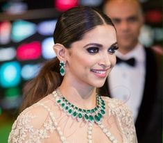 This Green American Diamond Jewelry with a Deepika Padukone-inspired touch, is a stunning Emerald Diamond Necklace, adorned with American Diamonds and Green CZ stones, that exude timeless charm. Embrace the allure of classic Indian designs and make a captivating statement on any occasion. *𝐏𝐑𝐎𝐃𝐔𝐂𝐓 𝐃𝐄𝐓𝐀𝐈𝐋* * Material: Brass * Plating: White Rhodium Plated * Stone: AAA Quality CZ Diamond & Emerald. *𝐃𝐈𝐌𝐄𝐍𝐒𝐈𝐎𝐍𝐒* *Necklace* * Weight:  62 gm Each * Length: 8 Inches * Width: 1.7 Oscar Jewelry, Emerald Diamond Necklace, Hollywood Jewelry, Bollywood Glamour, Emerald Green Necklace, Diamond Jewelry Set, American Diamond Jewellery, American Diamond Necklaces, Silver Necklace Set