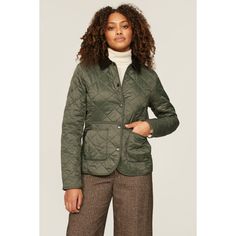 Green quilted nylon (100% Polyamide). Lining (100% Polyester). Jacket. Long sleeves. Collar. Front button closure. 25" from shoulder to hemline. Imported. Classic Fitted Quilted Jacket For Winter, Fitted Quilted Jacket With Padded Collar For Work, Fitted Quilted Jacket With Padded Collar For Spring, Fitted Quilted Jacket With Button Closure For Work, Classic Quilted Jacket For Winter Workwear, Quilted Jacket With Padded Collar For Fall Workwear, Long Sleeve Puffer Quilted Jacket For Work, Long Sleeve Quilted Puffer Jacket For Work, Classic Winter Quilted Jacket For Workwear