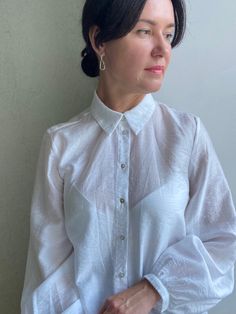 "Adou vintage style  white blouse with  puffy sleeves. Excellent vintage condition!  No holes or spots.  **Material: polyester  **Has no size tags, seems like fits sizes M/L. Model is size M and 170 cm 66.8\" height , bust 89cm/35.0\" **This item will come to you freshly laundered and ready to wear. **If you want to purchase more items, please message me, I will make a special price and delivery." Style White Blouse, Puffy Sleeves Blouse, Lantern Sleeved Blouses, Sleeves Blouse, Vintage Blouse, Puffy Sleeves, Cotton Blouse, Womens Blouses, Lantern Sleeve