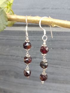 Garnet gemstone faceted rondelle beaded silver earring , earring gift for her, garnet faceted rondelle earrings, boho earring, every day earrings, gift for daughter, gemstone faceted rondelle  sterling silver earrings hand made with love and passion. Item: garnet earring pair  Metal: sterling silver Metal purity: 92.5% Length: 5.5 cm Sterling Silver Faceted Beads Earrings For Gift, Garnet Jewelry With Faceted Round Beads, Sterling Silver Earrings With Faceted Beads For Gifts, Elegant Gemstone Beaded Earrings For Gift, Garnet Round Beads Jewelry For Gifts, Garnet Jewelry With Round Beads For Gifts, Faceted Round Bead Earrings As Gift, Faceted Round Beaded Earrings As Gift, Faceted Beaded Earrings With Round Beads As Gift