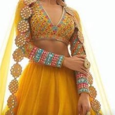 Mustard Lengha, With Intricate Details On The Sleeve And Bottom Of Lengha. Worn Once And Dry Cleaned And Ready For The Next Princess To Enjoy! *Can Be Fitted To Your Size, There’s Room Inside The Blouse To Get It Tightened* Mirror Lehenga, Orang India, Haldi Outfit, Mehendi Outfits, Indian Outfits Lehenga, Lehnga Dress, Salwar Designs, Gaun Fashion, Multi Color Blouse