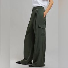 The Elm Wide Cargo Pants In Olive From Frankie Shop Blend Functionality With Style. Featuring A High-Rise Waist And Wide-Leg Silhouette, These Pants Offer A Contemporary Twist On Classic Cargo Pants With Their Utility Pockets And Relaxed Fit. Ideal For Both Day And Night, Pair Them With A Simple Tee For A Causal Look Or Dress Them Up With A Blouse And Heels. Never Worn As They Are So Long Wide Cargo Pants, Side Seam Pocket, The Frankie Shop, Relax Pants, Shop Pants, Elastic Shorts, Frankie Shop, Long Maxi Skirts, Simple Tees