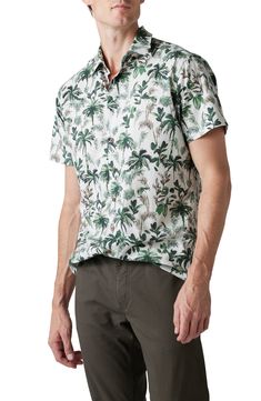 This breathable cotton sport shirt features a tropical print that takes you from desk to barbecue with ease. 29" length; 43" chest (size Medium) Point collar Short sleeves 100% cotton Machine wash, line dry Imported Casual Collared Camp Shirt With Palm Tree Print, White Cotton Tropical Camp Shirt, White Tropical Cotton Camp Shirt, White Tropical Cotton Shirt, Casual Short Sleeve Shirt With Plant Print, Hawaiian Button-up Top With Palm Tree Print, Hawaiian Button-up Tops With Palm Tree Print, Cotton Shirt With Palm Tree Print For Vacation, Tropical Collared Camp Shirt With Palm Tree Print