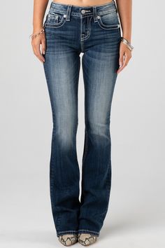 Relax in this pair of mid rise dark wash bootcut jeans detailed with a border embroidery design, studded trim and a faux flap pocket with rhinestone rivets.
98% Cotton, 2% Elastane
Machine Wash Separately In Cold Water With Like Colors
Front Rise: 9"; Back Rise: 14”
Inseam: 34"
Style No. M3909B-K1126 Dark Wash Bootcut Jeans, Womens Jeans Bootcut, Denim Pants Women, Dark Blue Jeans, Jeans Bootcut, Womens Jeans, Casual Fall Outfits, My Dream Closet, Blue Jean