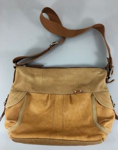 Fossil British Tan Leather Cross-Body Shoulder Bag Handbag Canvas Strap Leather Pouch Bag With Pockets, Brown Pouch Shoulder Bag, Light Brown Double Handle Shoulder Bag For Errands, Light Brown Shoulder Bag With Zipper Closure, Casual Light Brown Bags With Zipper Closure, Light Brown Casual Shoulder Bag For Errands, Casual Light Brown Shoulder Bag For Errands, Tan Satchel Shoulder Bag With Adjustable Strap, Yellow Satchel Shoulder Bag With Pockets