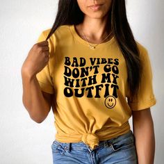 Find this cute shirt on my website, available in multiple colors!
#goodvibes  #goodenergy #positiveenergy #mindset Casual Smiley Face T-shirt, Cheap Trendy T-shirt With Smiley Face, Affordable Fun Smiley Face T-shirt, Cheap Fun T-shirt With Smiley Face, Happiness Tshirt, Smiley Face Tshirt, Vibes Outfit, Bad Vibes, Cute Shirt