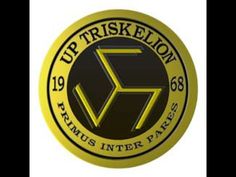 the up triskelon logo is shown in black and gold on a white background