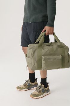 BÉIS 'The Sport Duffle' in Olive - Olive Green Sport Duffle & Gym Bag Sporty Nylon Travel Bag For On-the-go, Casual On-the-go Duffle Bag With Luggage Sleeve, Versatile Duffle Bag With Functional Pockets For On-the-go, Practical Gym Bag With Luggage Sleeve For On-the-go, Practical Gym Bag With Luggage Sleeve, Sporty Large Capacity Luggage For On-the-go, Sporty Double Handle Gym Bag For On-the-go, Large Capacity Sporty Luggage, Casual Duffle Bag Backpack For On-the-go