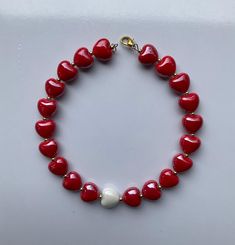 Statement Chocker necklace made with porcelain beads in heart shape. Available in white, red, and blue colors. Handmade White Beaded Necklace For Valentine's Day, Porcelain Beads, Chocker Necklace, Red Necklace, Necklace Red, Necklace White, Austin Tx, Beaded Necklaces, Heart Shape