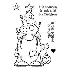 a christmas tree stamp with the words it's beginning to look a lot like christmas